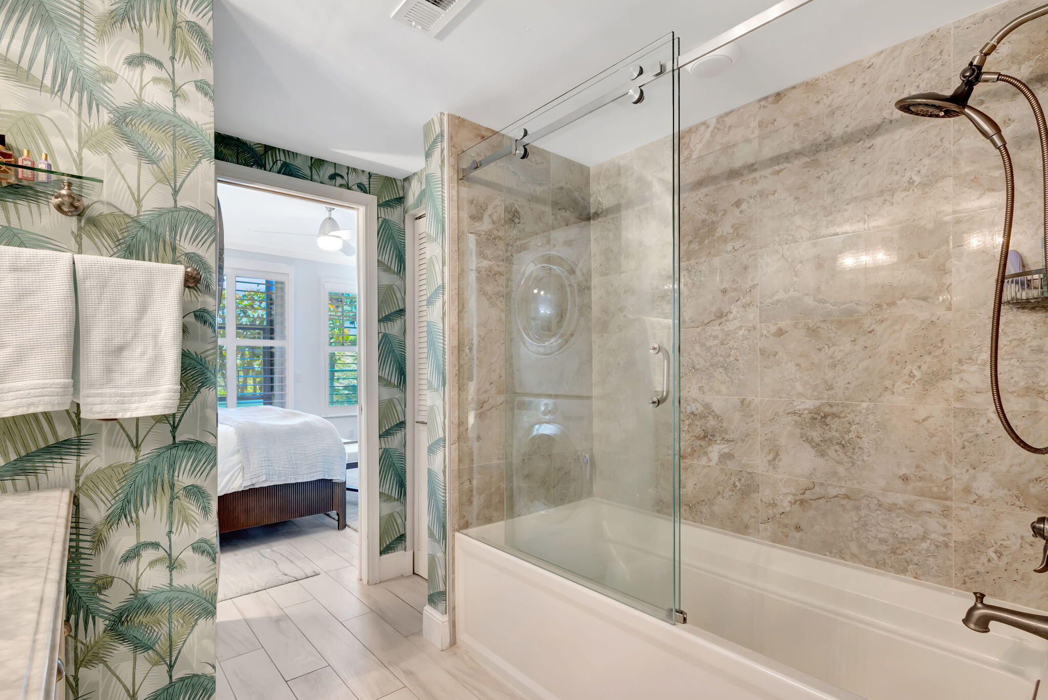 204 Mainsail Circle Jupiter, FL 33477 - Photo 35 of 60 a bathroom with a tub and a shower