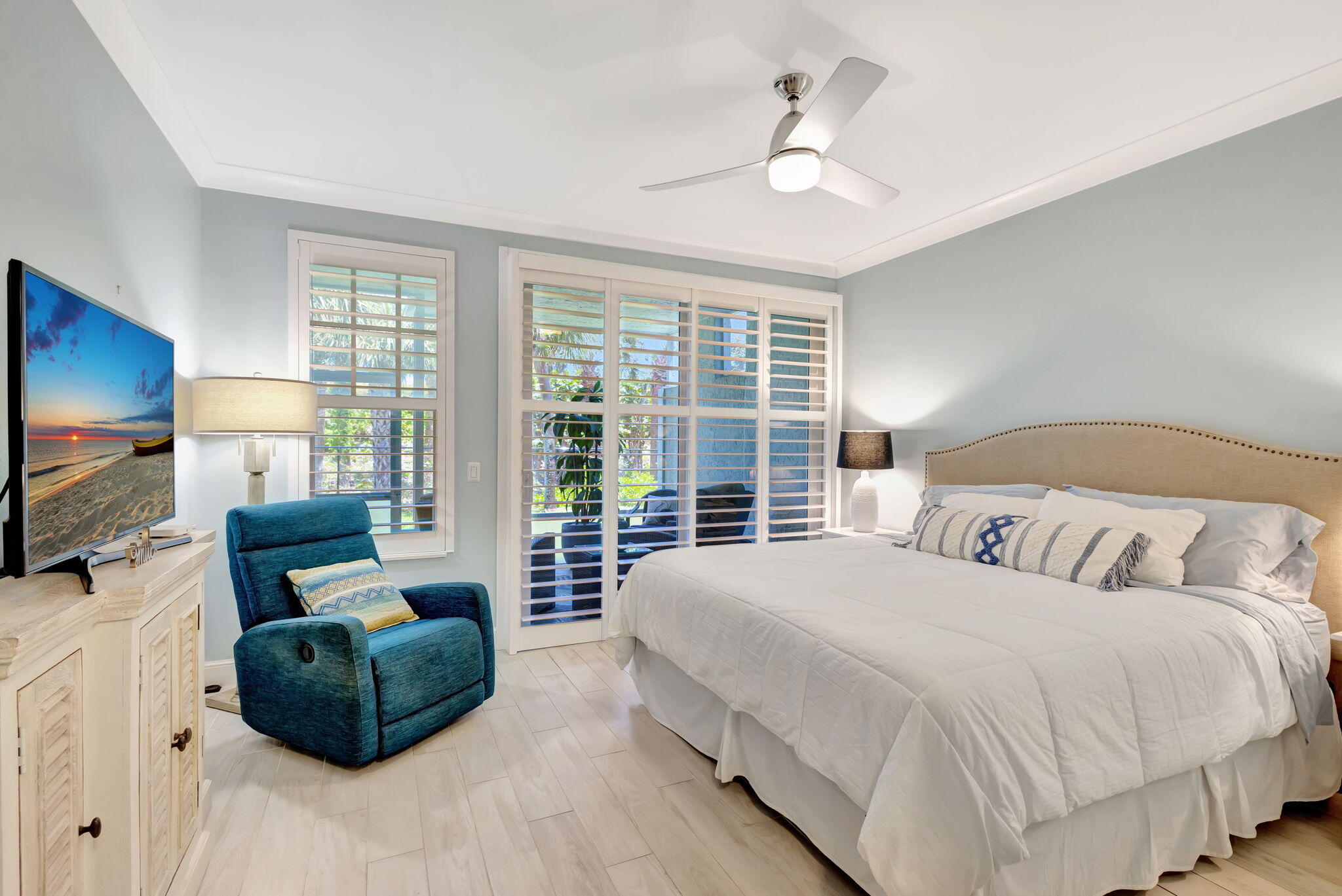 204 Mainsail Circle Jupiter, FL 33477 - Photo 37 of 60 a bedroom with a large bed and a flat screen television