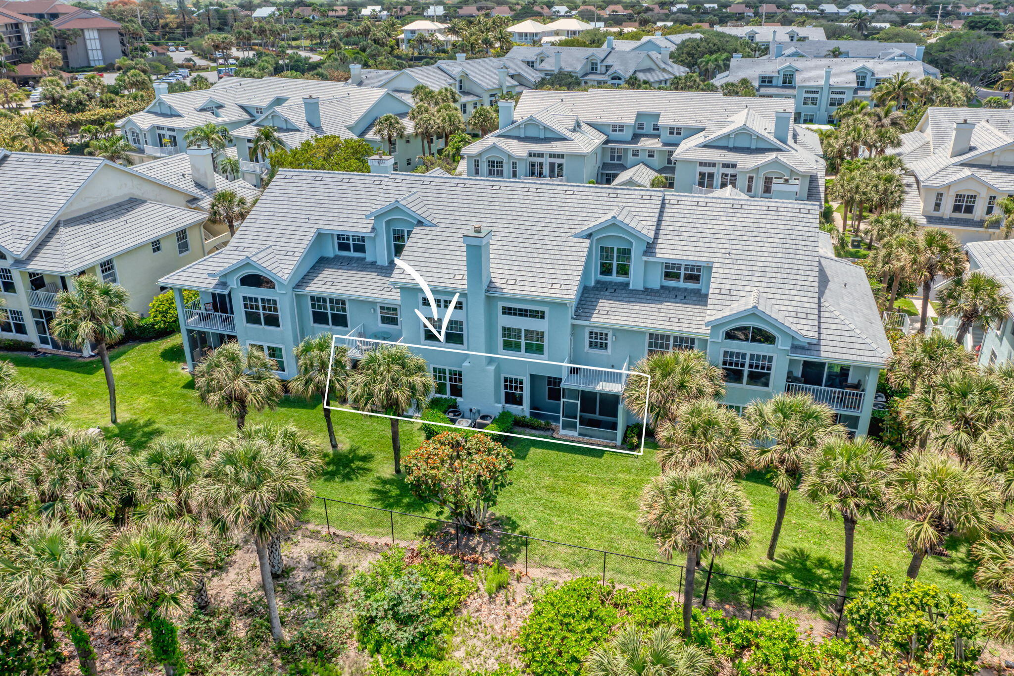 204 Mainsail Circle Jupiter, FL 33477 - Photo 44 of 60 an aerial view of residential houses with outdoor space and trees
