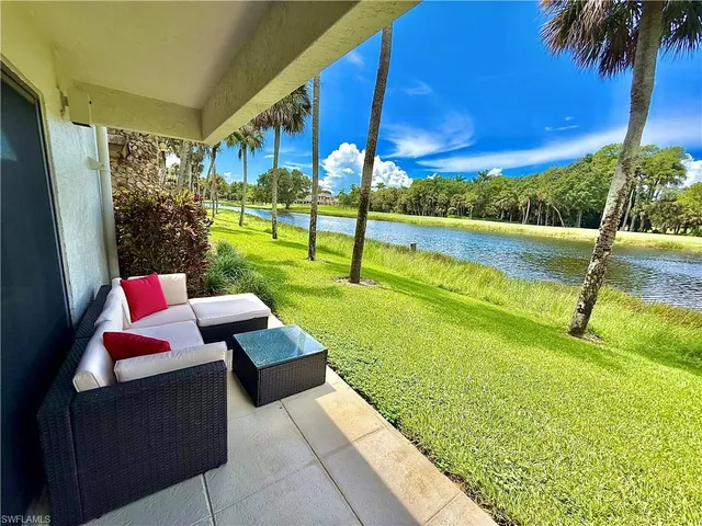 a view of swimming pool with a yard