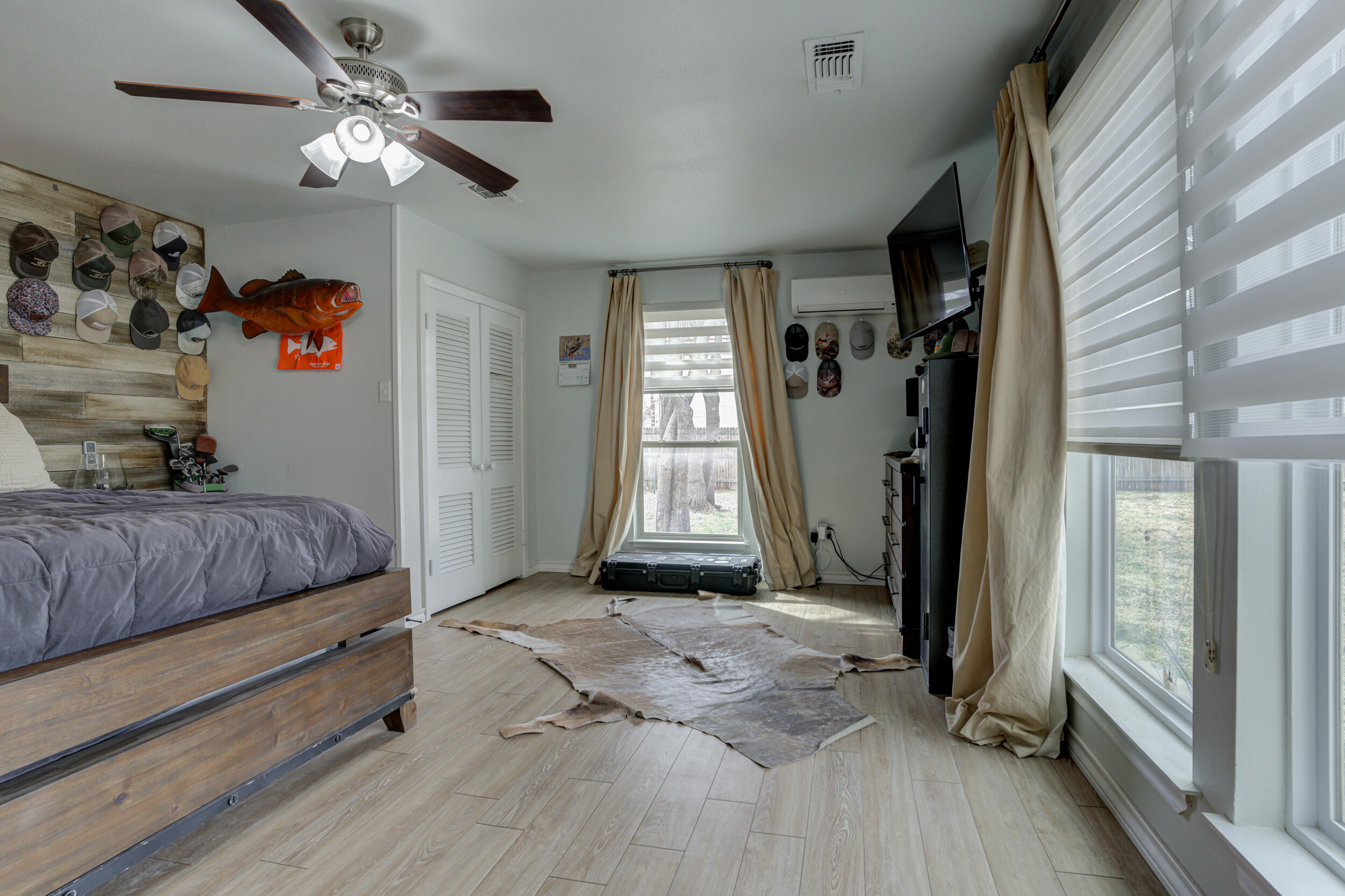 2515 33rd Street Lubbock, TX 79410 - Photo 24 of 41 a bedroom with a bed and a window