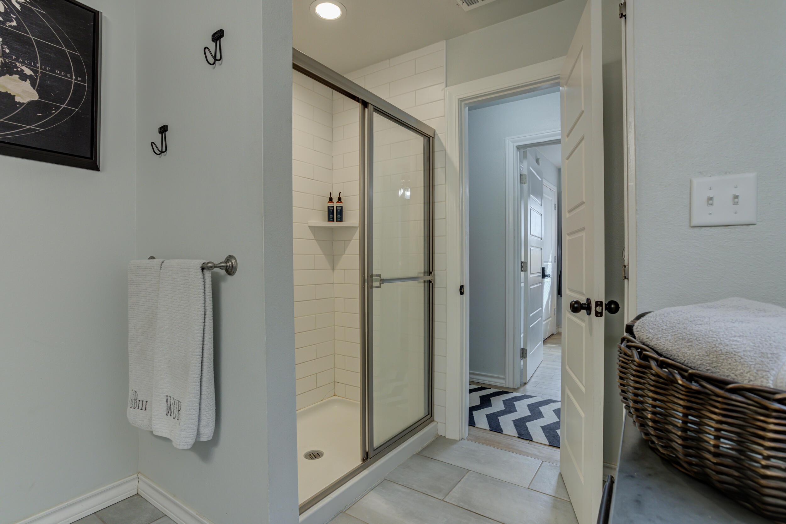 2515 33rd Street Lubbock, TX 79410 - Photo 30 of 41 a bathroom with a shower and a sink