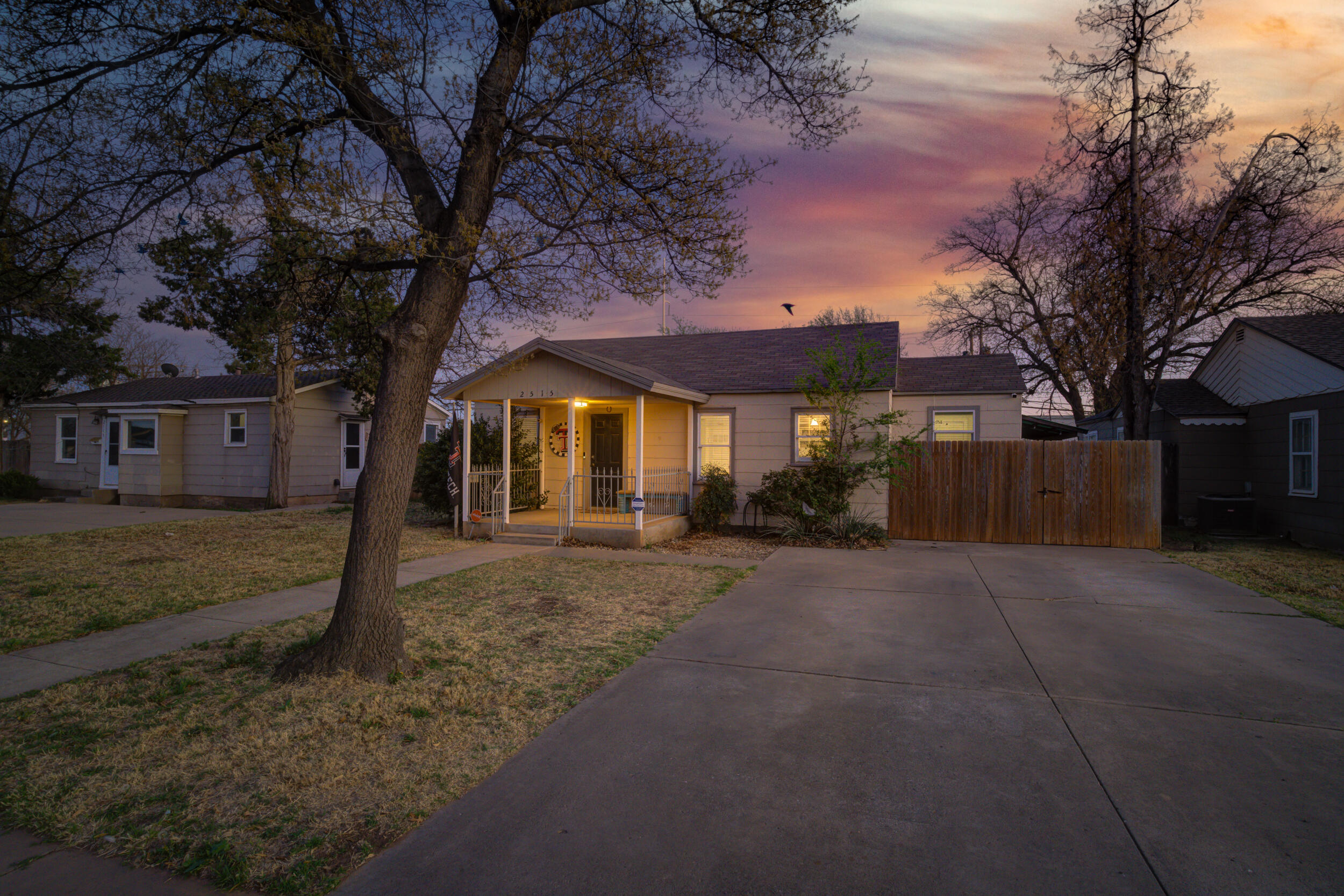 2515 33rd Street Lubbock, TX 79410 - Photo 3 of 41 a view of a house with a yard
