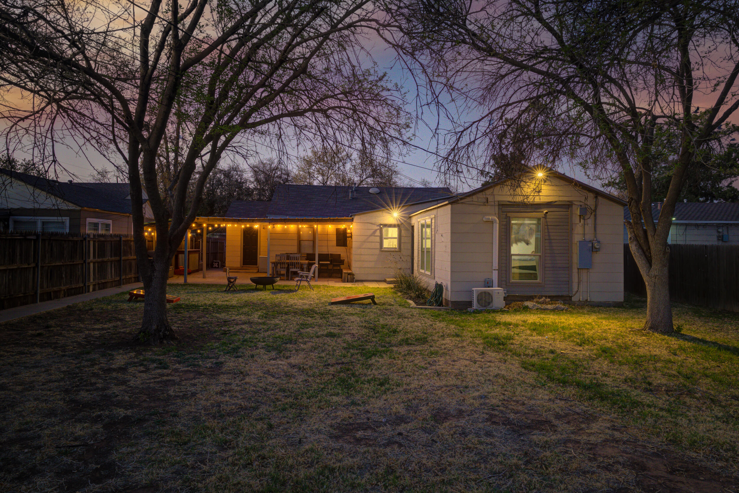 2515 33rd Street Lubbock, TX 79410 - Photo 39 of 41 a view of a house with backyard and trees
