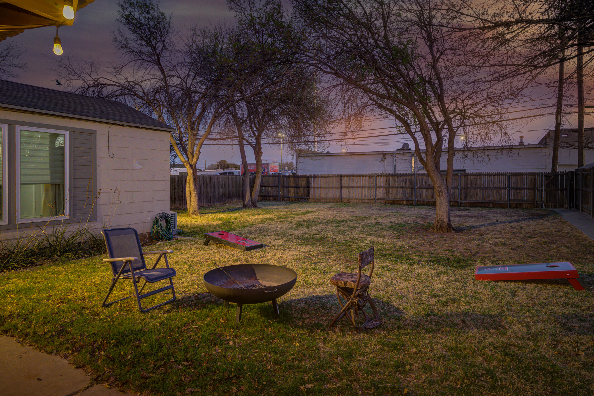 2515 33rd Street Lubbock, TX 79410 - Photo 41 of 41 a backyard of a house with table and chairs