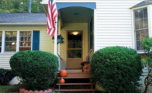 3 Falls Road Sturbridge, MA 01566 - Photo 4 of 28 a front view of a house with a garden