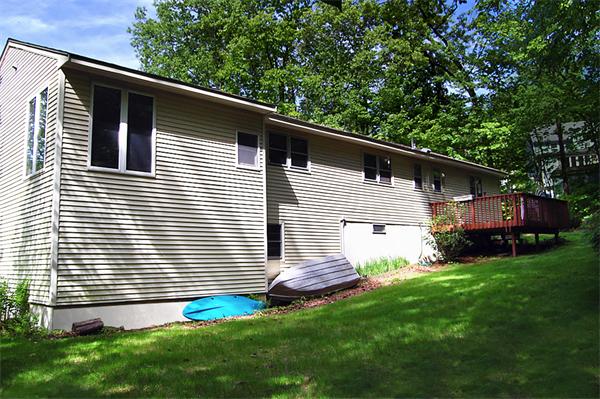3 Falls Road Sturbridge, MA 01566 - Photo 5 of 28 a front view of house with yard and green space