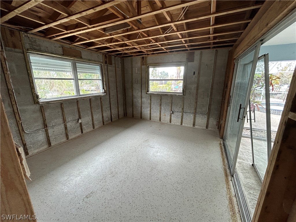 740 Windlass Way Sanibel, FL 33957 - Photo 11 of 22 a view of empty room with windows