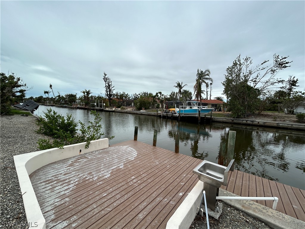 740 Windlass Way Sanibel, FL 33957 - Photo 20 of 22 a view of a lake with houses