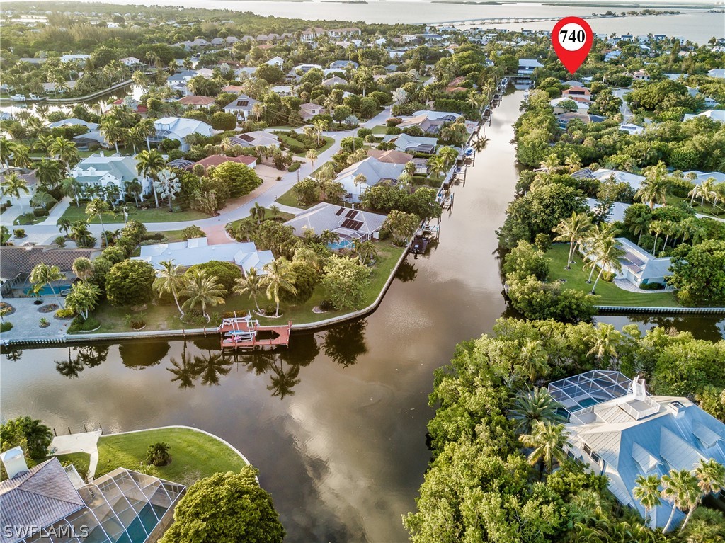 740 Windlass Way Sanibel, FL 33957 - Photo 4 of 22 an aerial view of a house with a lake view