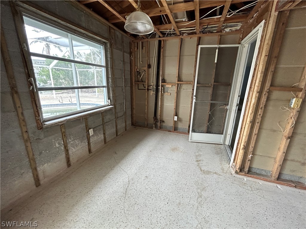 740 Windlass Way Sanibel, FL 33957 - Photo 8 of 22 an empty room with windows