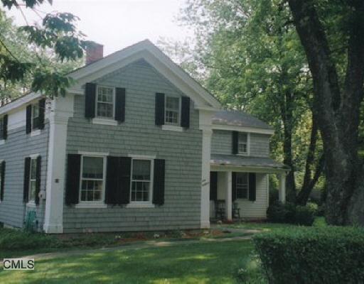28 Wells Hill Road Salisbury, CT 06039 - Photo 1 of 1 a front view of a house with a yard