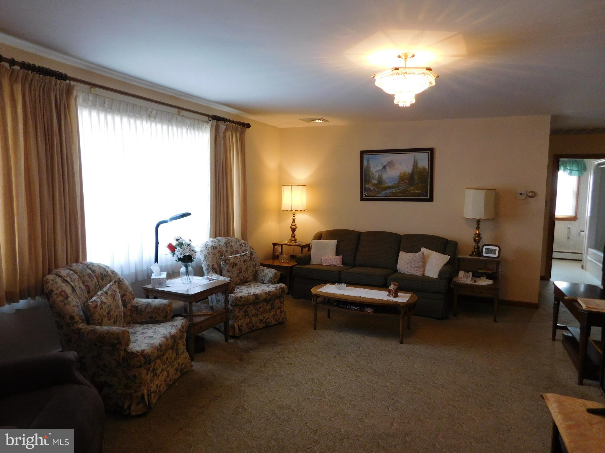 150 East Ruddle Street Coaldale, PA 18218 - Photo 3 of 12 a living room with furniture and a large window