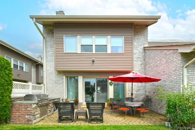 a view of a dinning tables and chairs in the patio