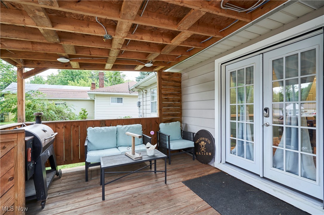 1129 Homestead Road Cleveland, OH 44121 - Photo 8 of 26 Wooden deck featuring french doors