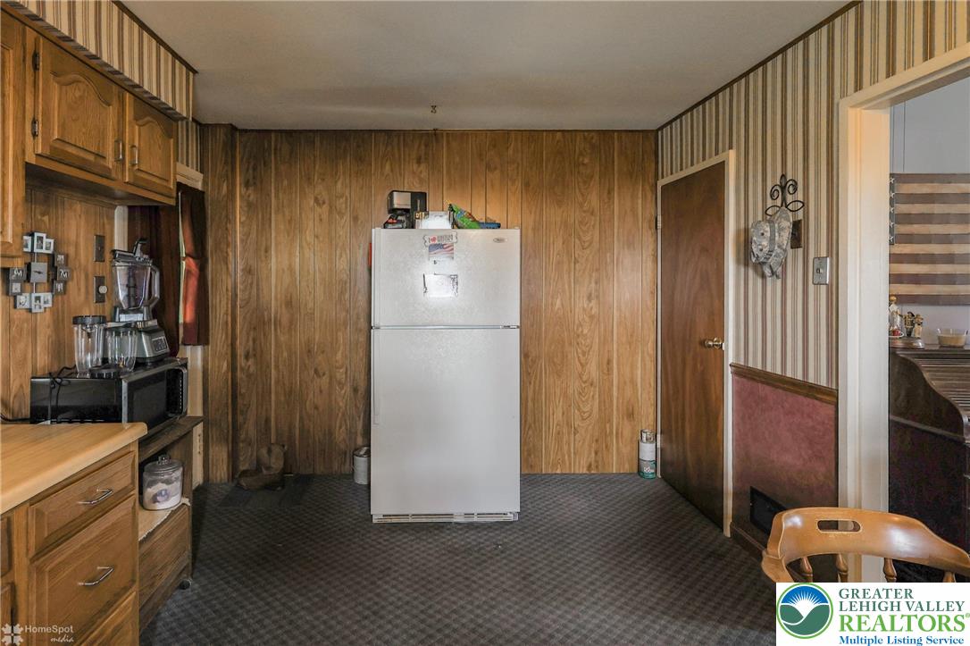 1336 Greenview Drive Bethlehem, PA 18018 - Photo 21 of 58 a view of a kitchen with refrigerator and wooden floor