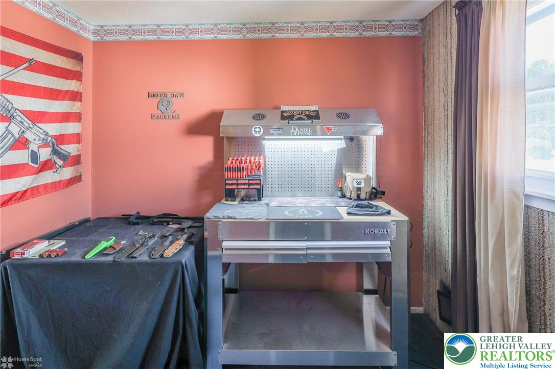 1336 Greenview Drive Bethlehem, PA 18018 - Photo 36 of 58 a room with a stove and a cabinet