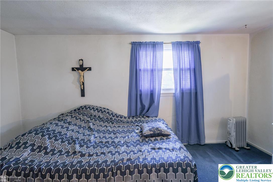 1336 Greenview Drive Bethlehem, PA 18018 - Photo 37 of 58 a bedroom with a bed and a window