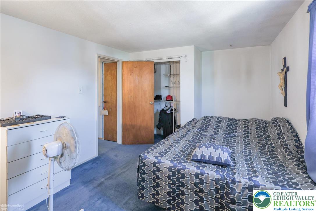 1336 Greenview Drive Bethlehem, PA 18018 - Photo 39 of 58 a bedroom with a bed and a dresser