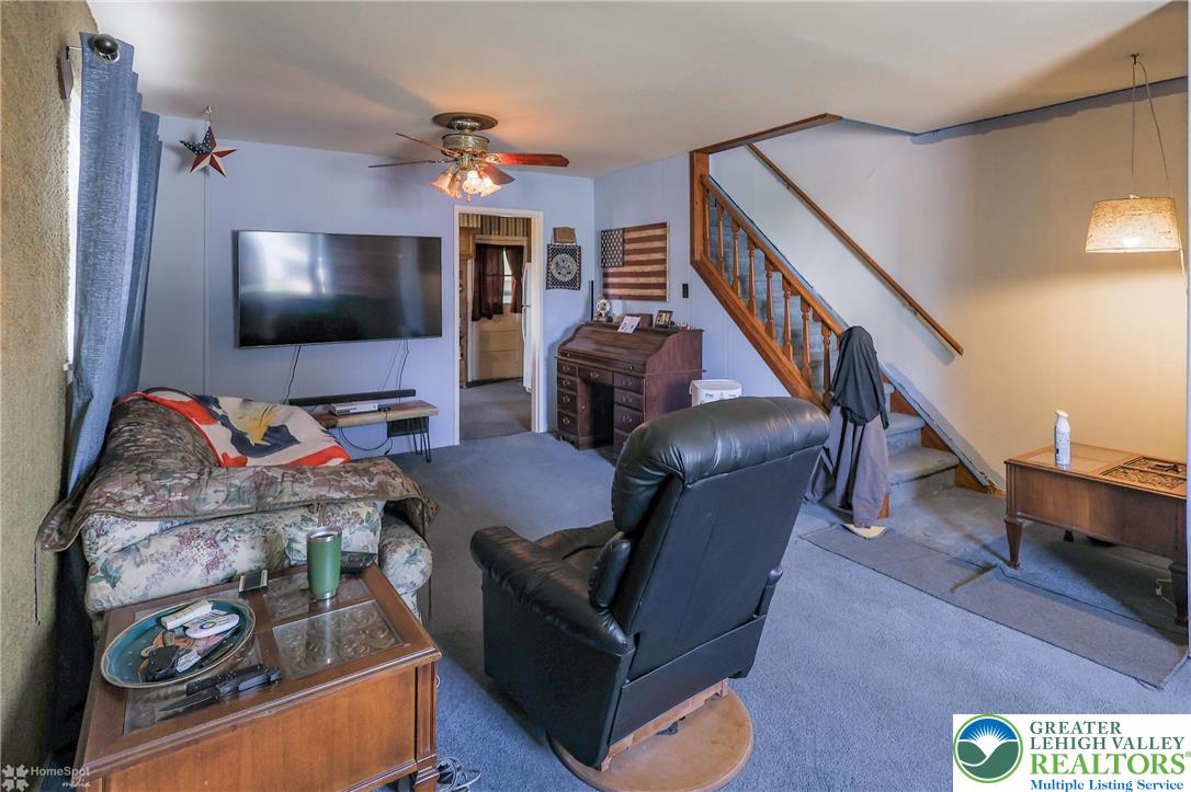 1336 Greenview Drive Bethlehem, PA 18018 - Photo 10 of 58 a living room with furniture and a flat screen tv