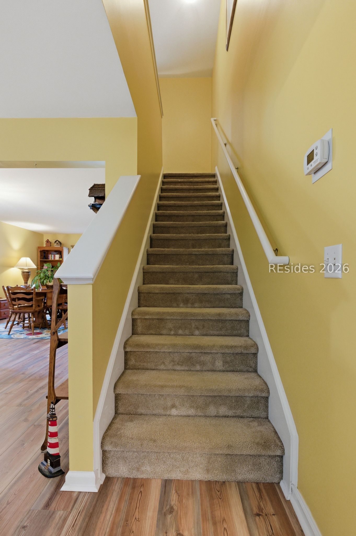 6 Hemlock Court Bluffton, SC 29910 - Photo 23 of 45 Central staircase leading to additional 4 bedrooms