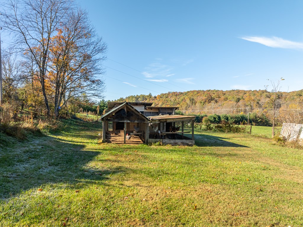 336 Old Skeenah Gap Road Suches, GA 30572 - Photo 23 of 81 a view of a house with a yard