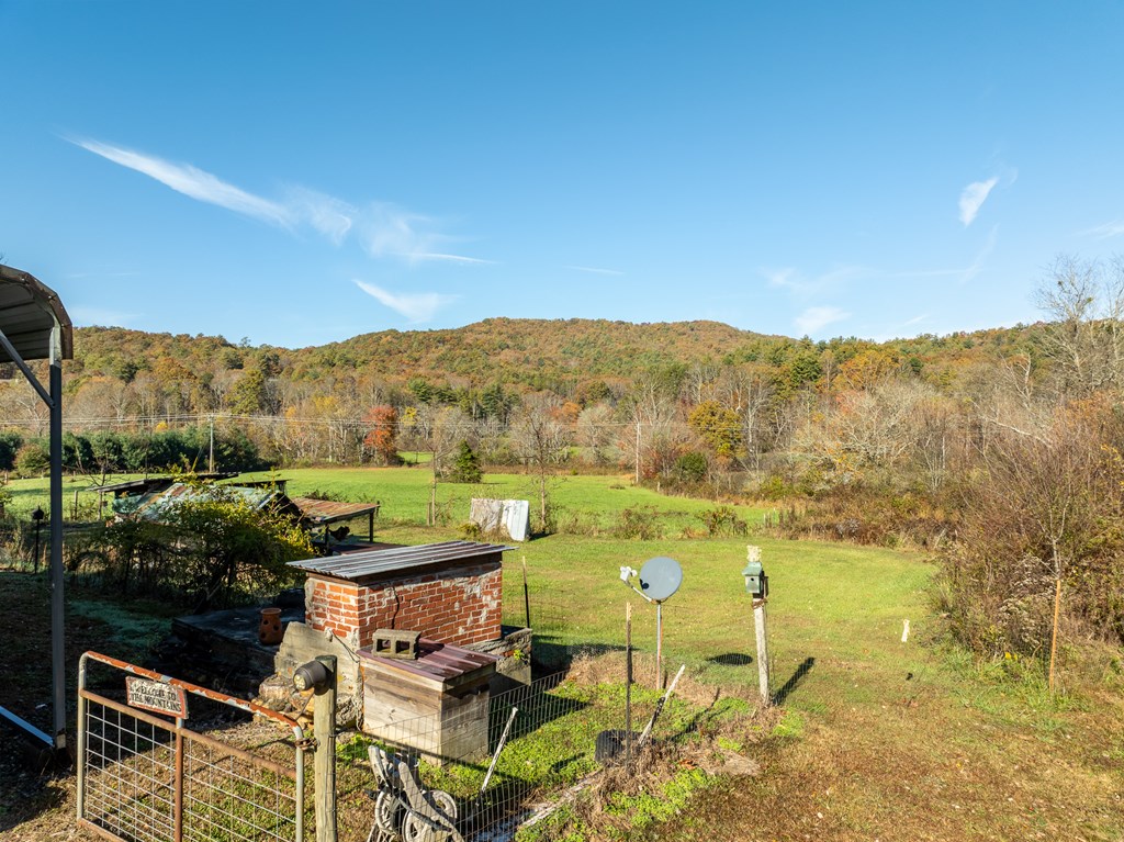 336 Old Skeenah Gap Road Suches, GA 30572 - Photo 28 of 81 an aerial view of a house with a yard