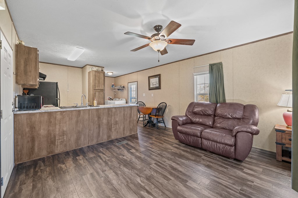 336 Old Skeenah Gap Road Suches, GA 30572 - Photo 32 of 81 a living room with furniture and a wooden floor