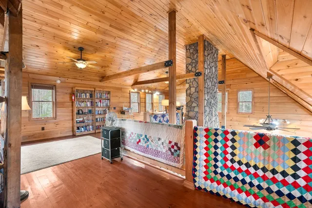 a view of outdoor space with wooden floor and furniture