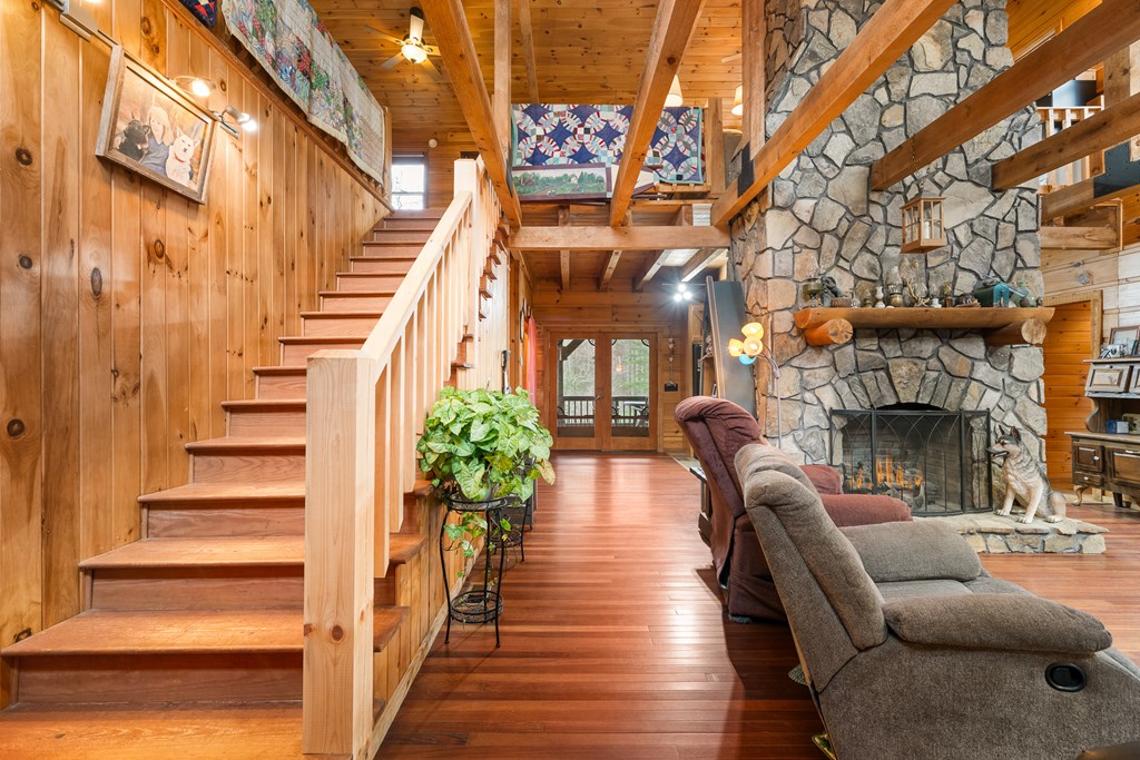 336 Old Skeenah Gap Road Suches, GA 30572 - Photo 57 of 81 a living room with furniture and a fireplace