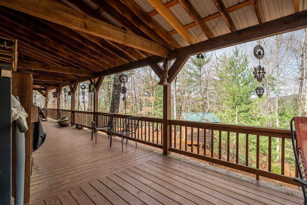 336 Old Skeenah Gap Road Suches, GA 30572 - Photo 80 of 81 a view of outdoor space with wooden floor and furniture