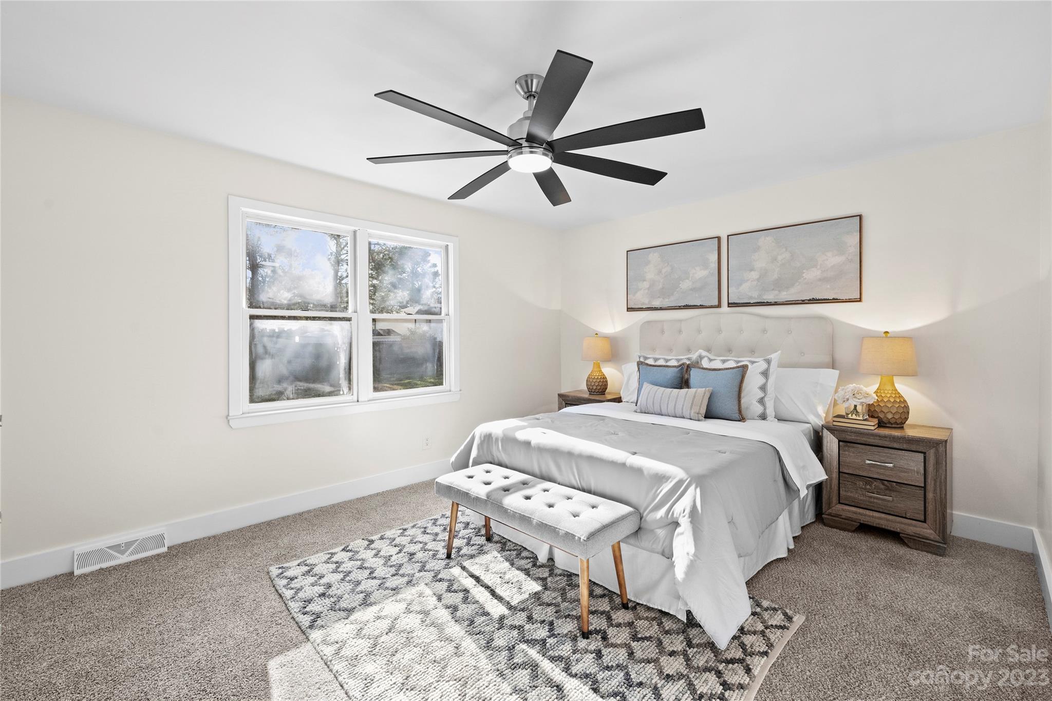1621 Brook Drive Fort Mill, SC 29708 - Photo 14 of 30 a bedroom with a bed and window
