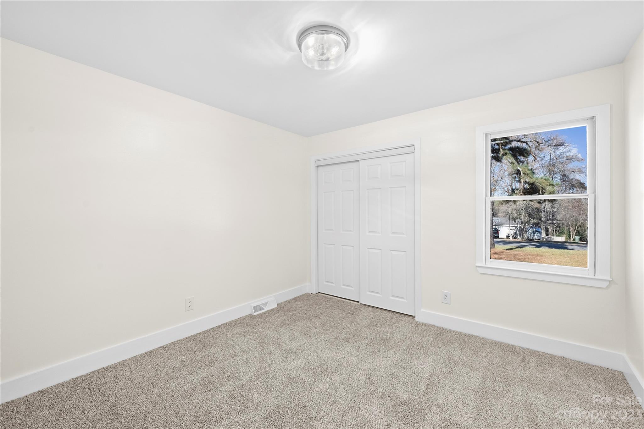 1621 Brook Drive Fort Mill, SC 29708 - Photo 22 of 30 an empty room with a window