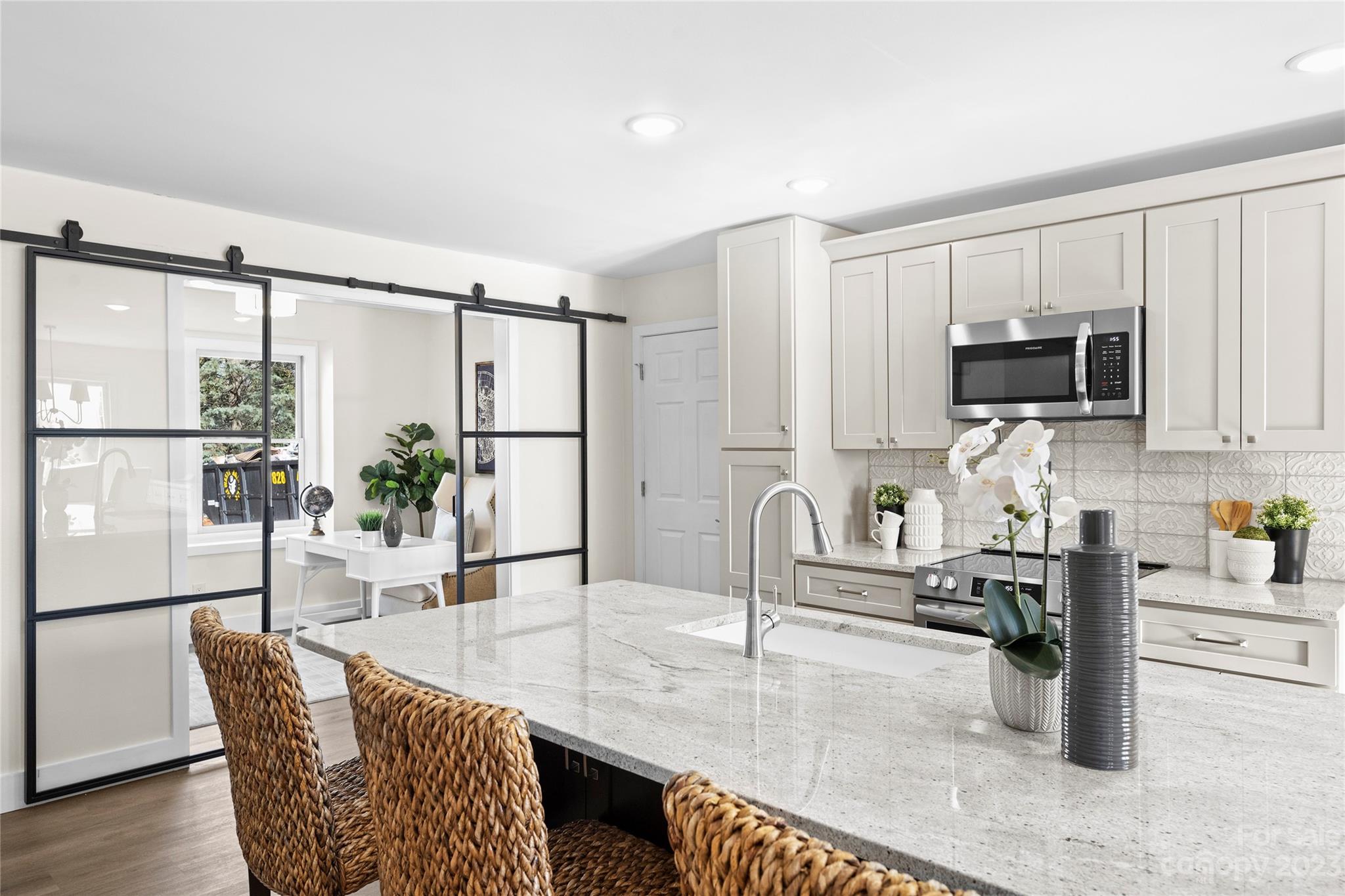 1621 Brook Drive Fort Mill, SC 29708 - Photo 24 of 30 a kitchen with counter top space cabinets and stainless steel appliances
