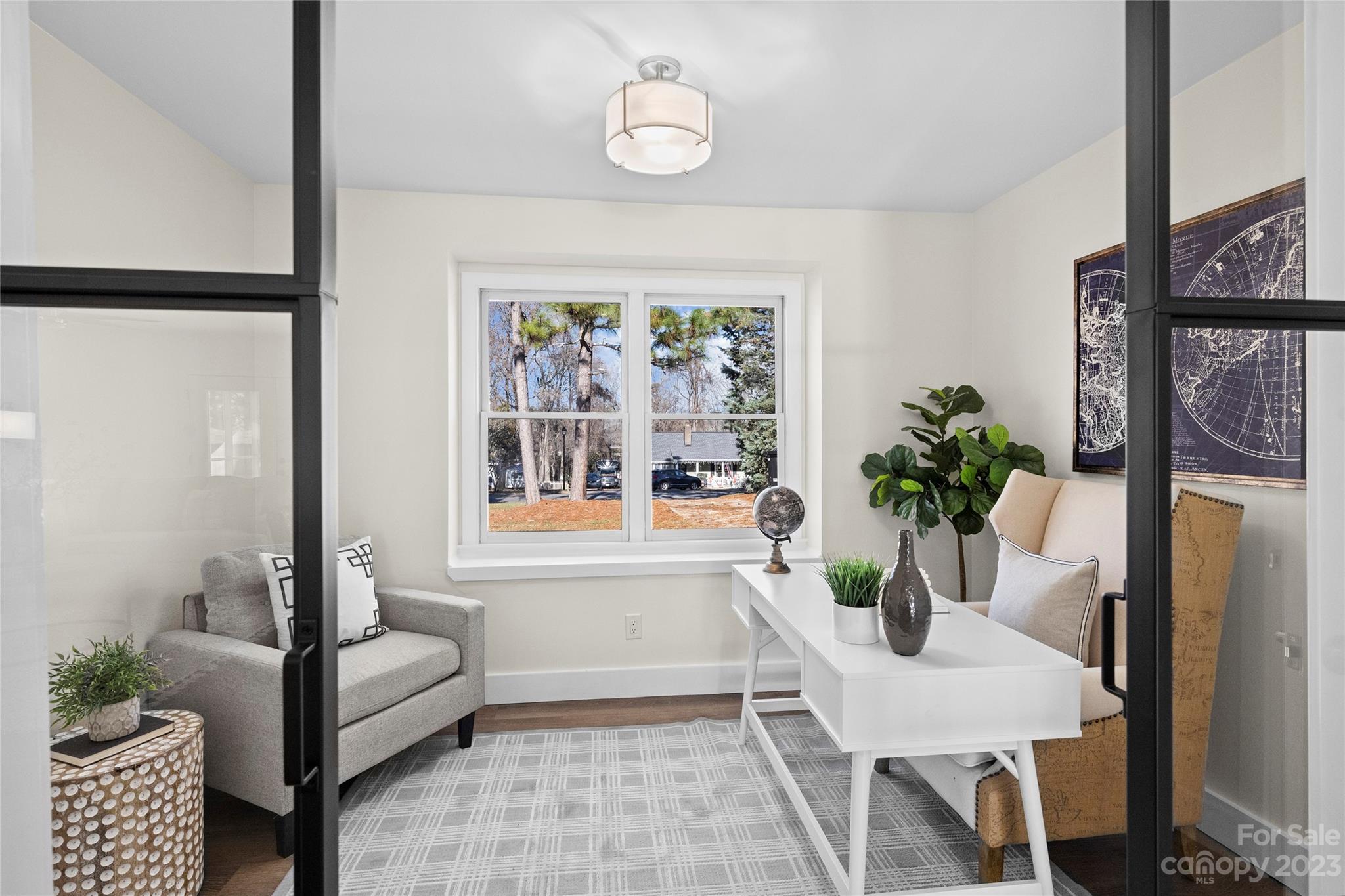 1621 Brook Drive Fort Mill, SC 29708 - Photo 4 of 30 a view of a dining room with furniture window and wooden floor