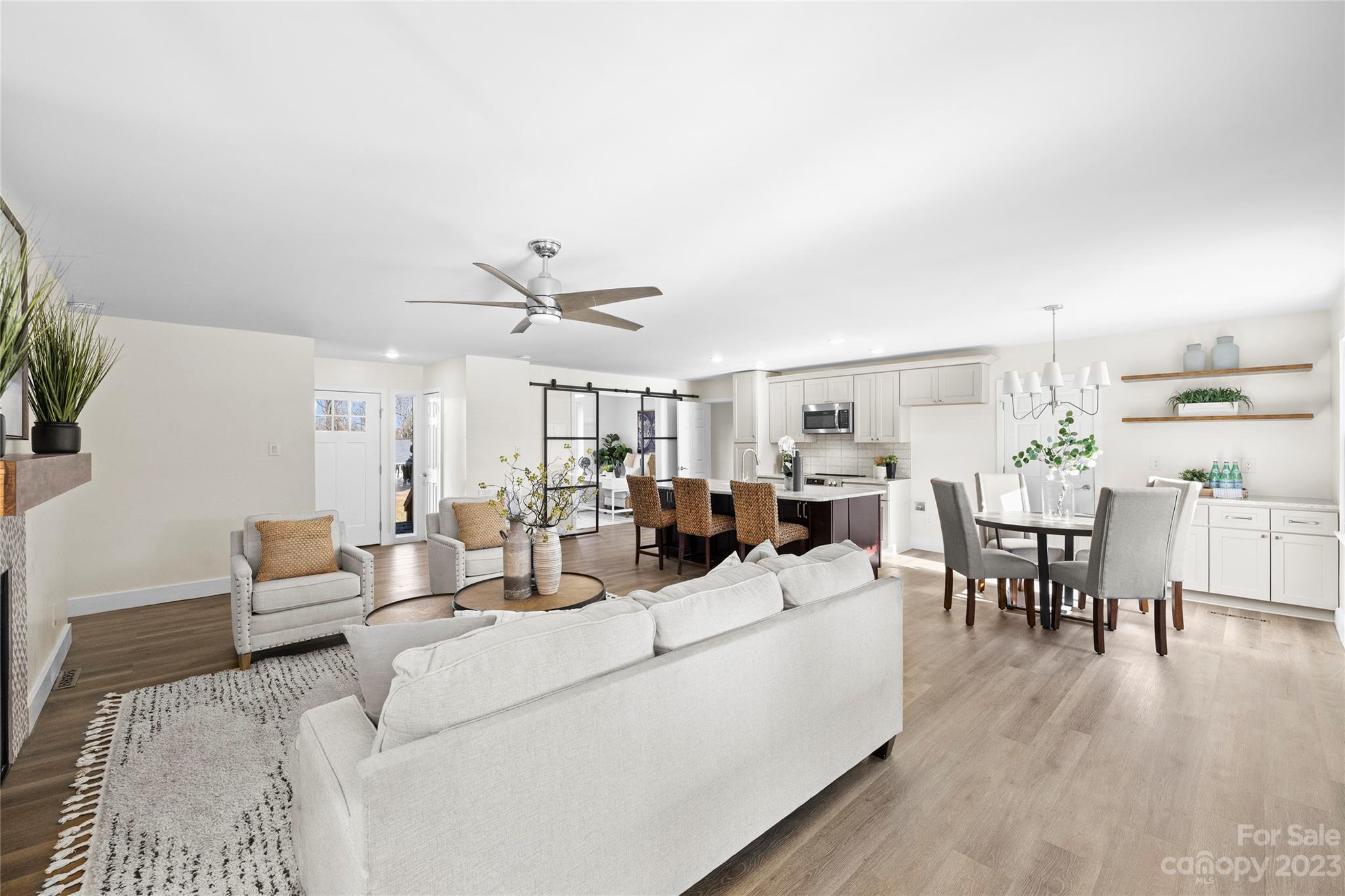1621 Brook Drive Fort Mill, SC 29708 - Photo 7 of 30 a living room with furniture and a wooden floor