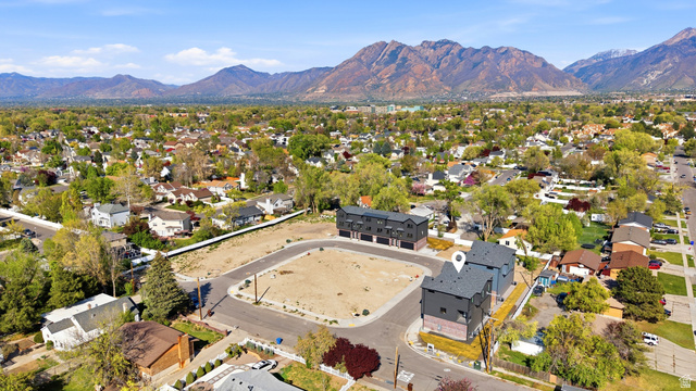 330 East 7635 S Street Sandy, UT 84047 - Photo 25 of 29 Aerial view of residential area featuring mountains