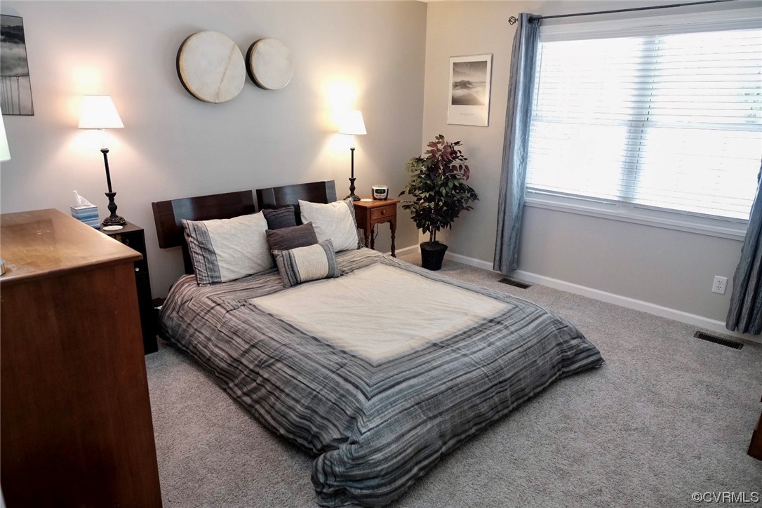 Undisclosed Address Aylett, VA 23009 - Photo 11 of 36 a bedroom with bed and a window