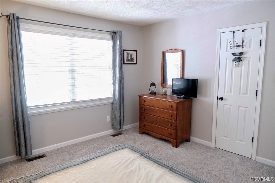 Undisclosed Address Aylett, VA 23009 - Photo 13 of 36 a room with furniture and window