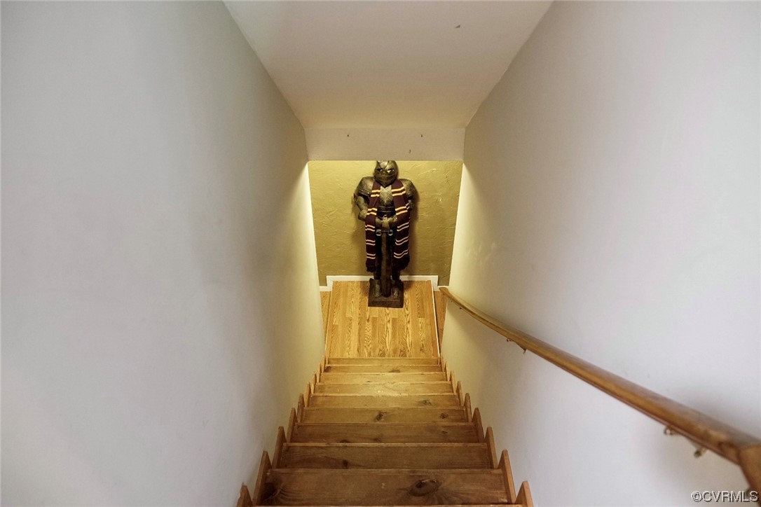 Undisclosed Address Aylett, VA 23009 - Photo 15 of 36 a view of a hallway with wooden floor and stairs