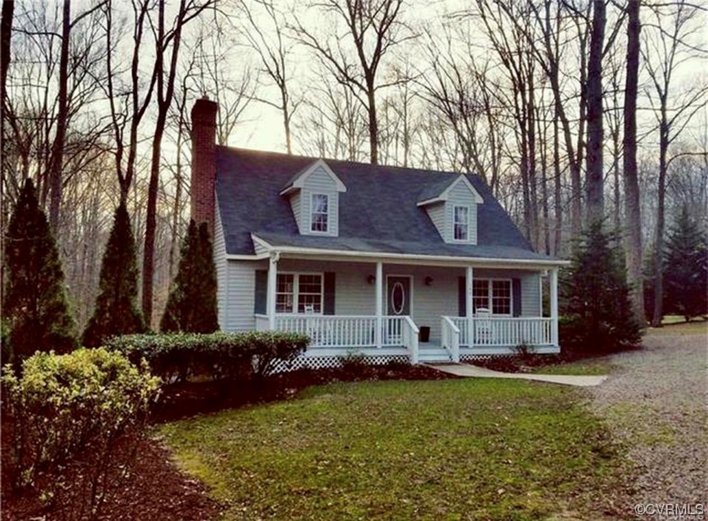 Undisclosed Address Aylett, VA 23009 - Photo 2 of 36 a front view of house with yard and green space