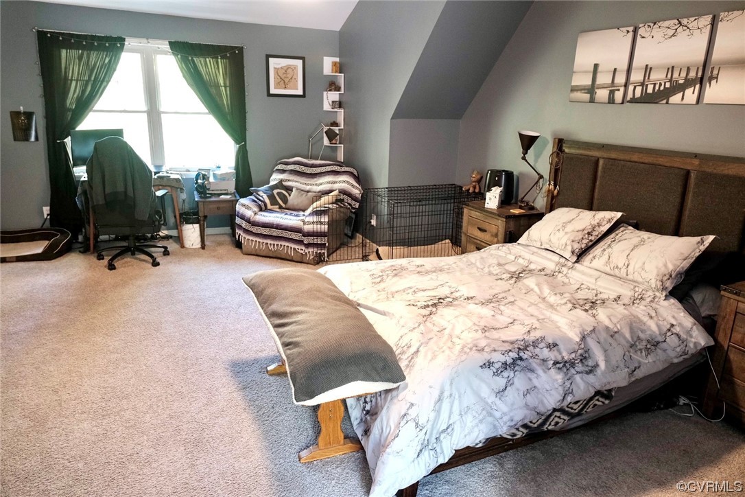 Undisclosed Address Aylett, VA 23009 - Photo 27 of 36 a bedroom with bed and a window