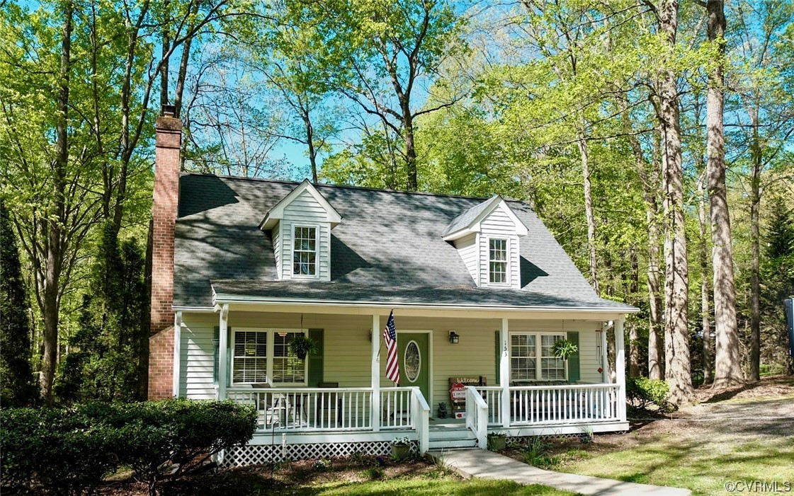 Undisclosed Address Aylett, VA 23009 - Photo 3 of 36 front view of a house with a yard