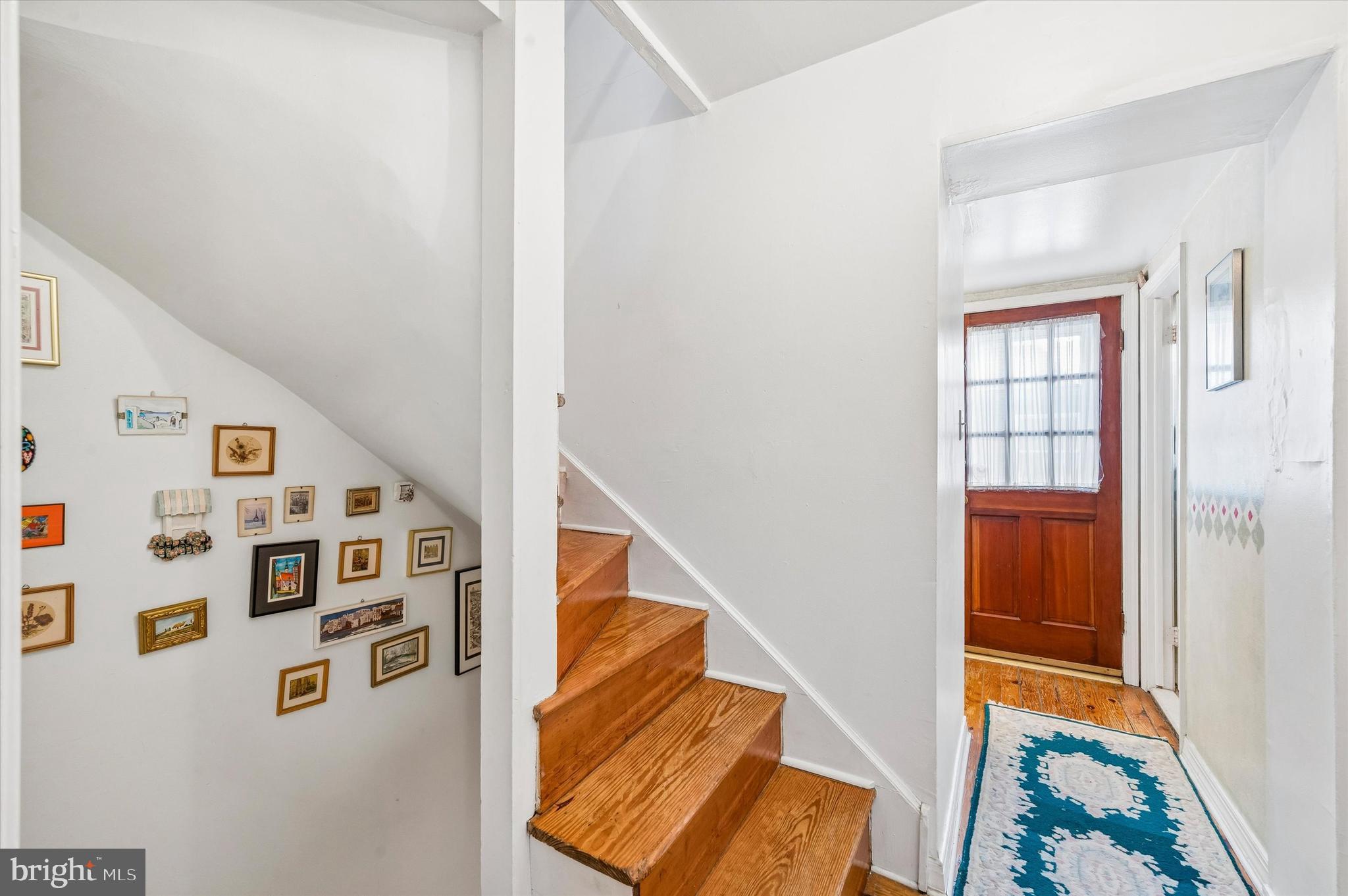 2119 Rodman Street Philadelphia, PA 19146 - Photo 15 of 24 a view of a hallway with workspace
