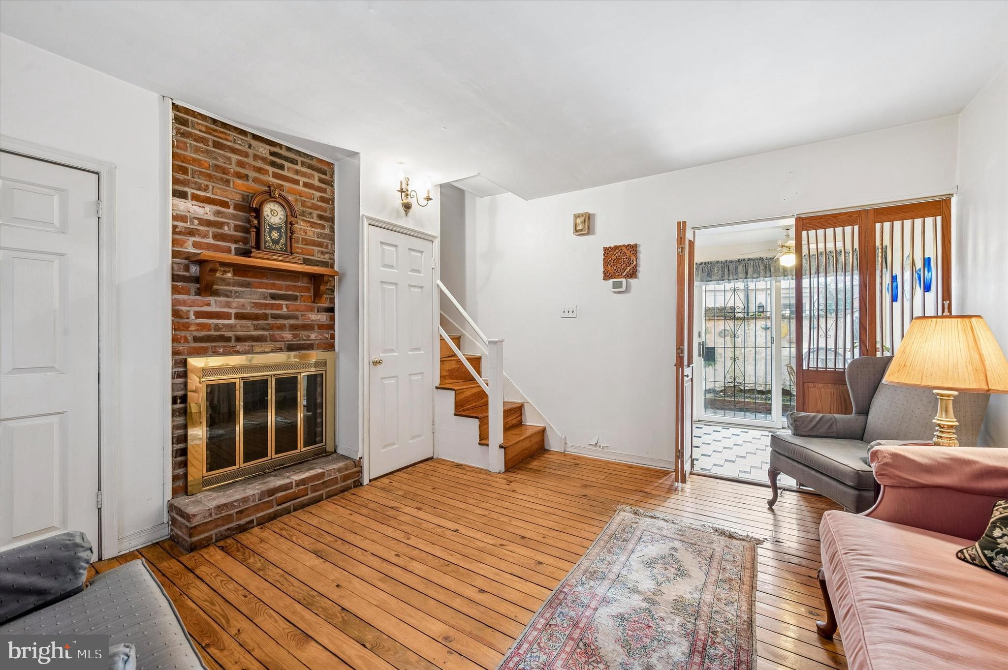 2119 Rodman Street Philadelphia, PA 19146 - Photo 2 of 24 a bedroom with furniture and a window