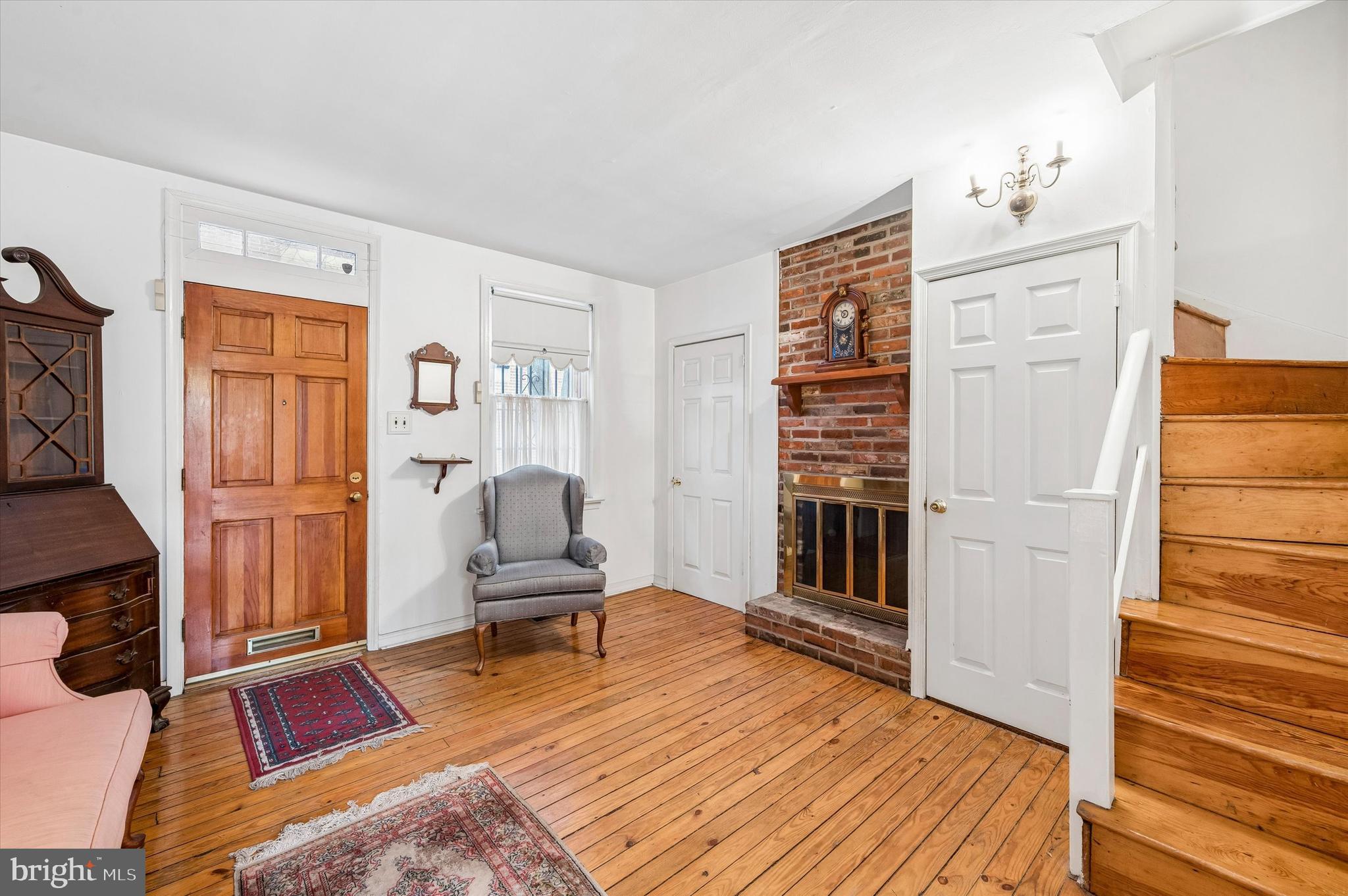 2119 Rodman Street Philadelphia, PA 19146 - Photo 4 of 24 a bedroom with furniture and a window