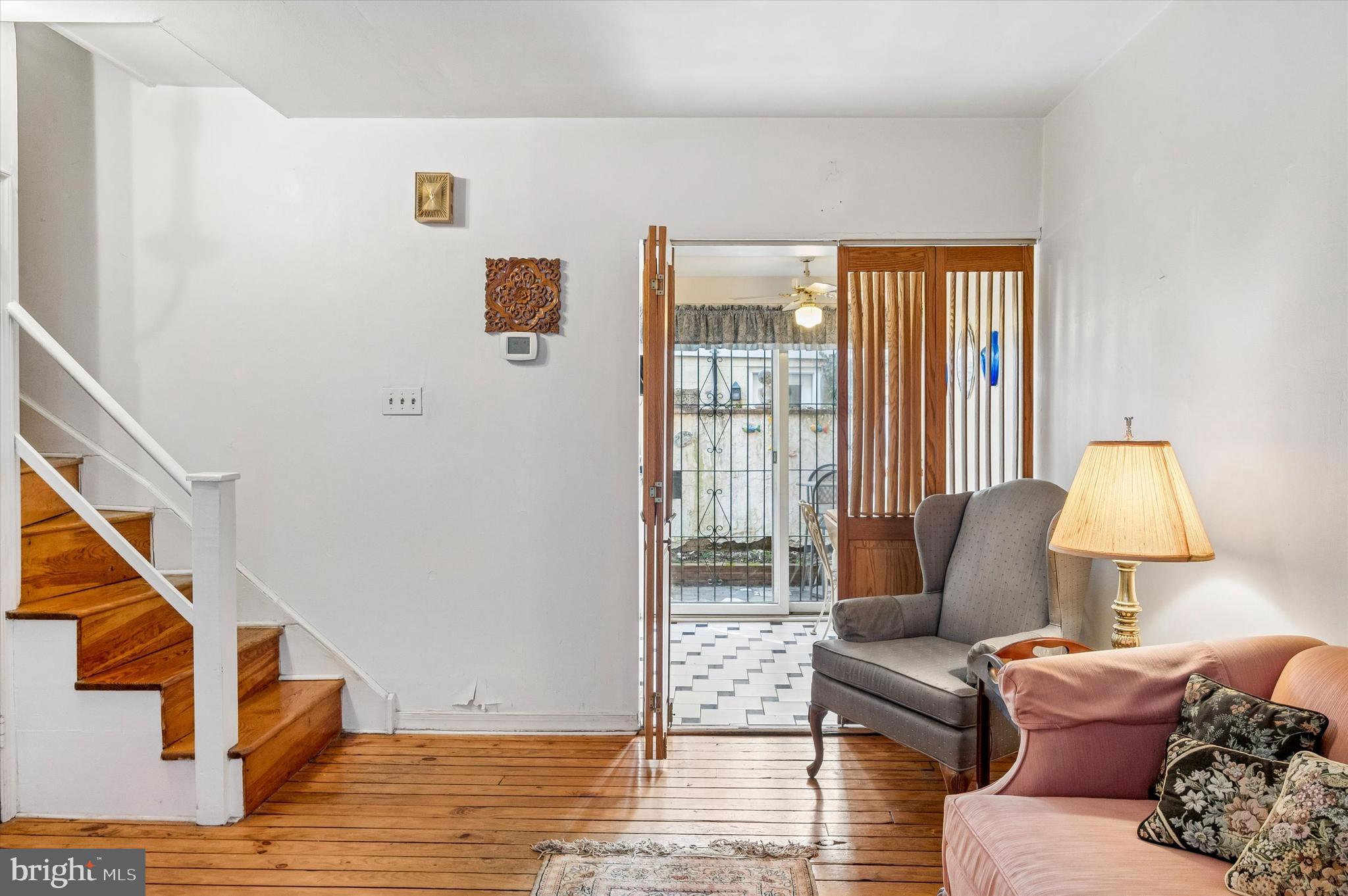 2119 Rodman Street Philadelphia, PA 19146 - Photo 6 of 24 a living room with furniture and a window