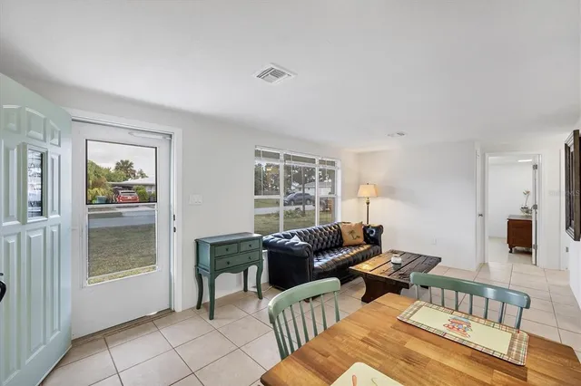 a kitchen with cabinets sink and stove