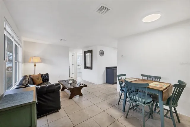 a kitchen with granite countertop a sink and cabinets