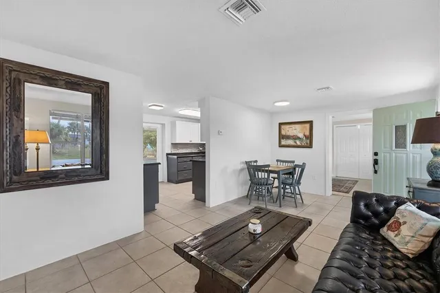 a kitchen with cabinets appliances a sink and a counter top space